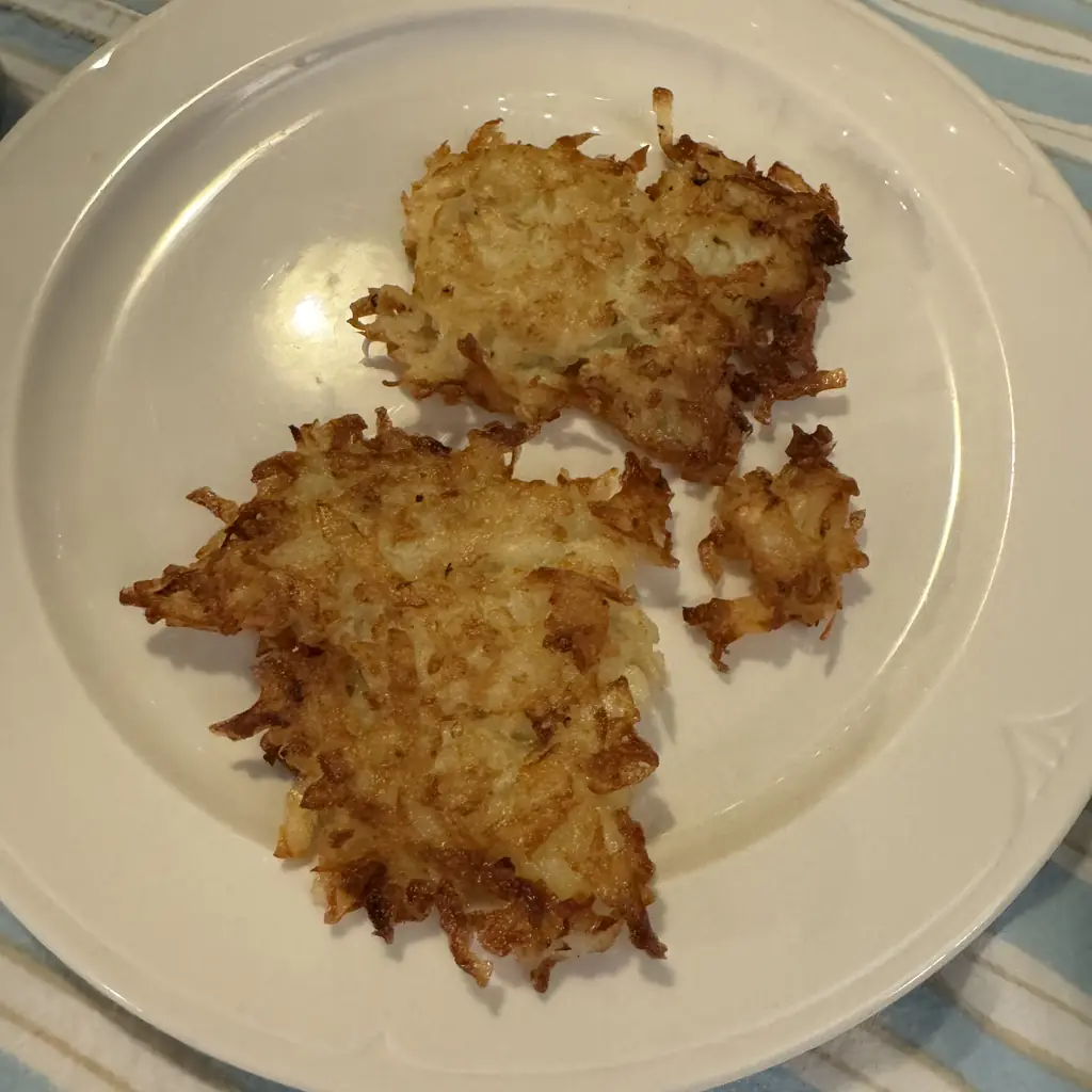 Potato pancakes on a plate.